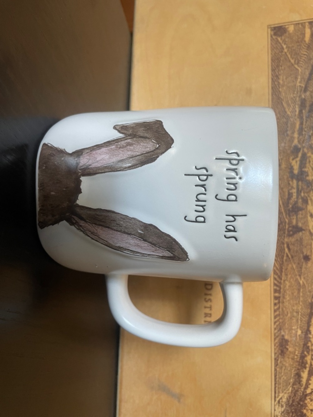 Rae Dunn Cream Mug with Brown Ear and 'spring has sprung' Text